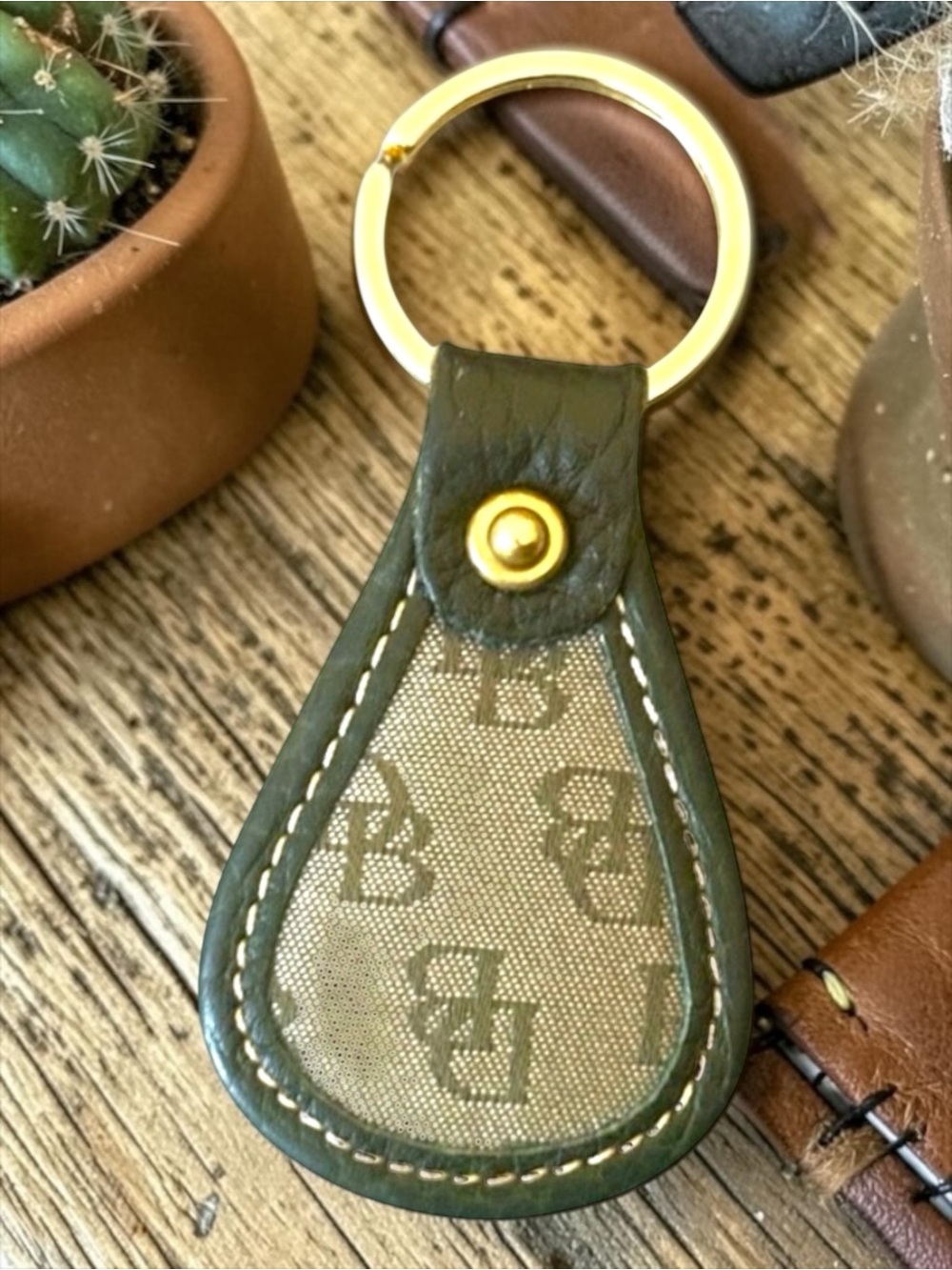 Dooney & Bourke Black Leather Keychain Reversible Sides Black &‎ Brown.